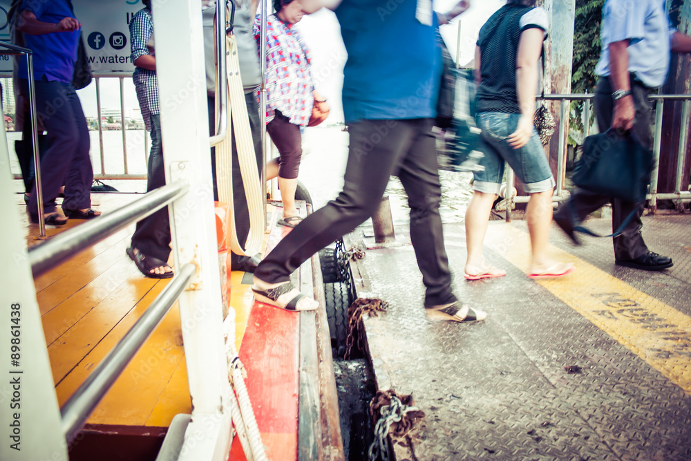 Fototapeta premium Walking out of the express boat in Bangkok