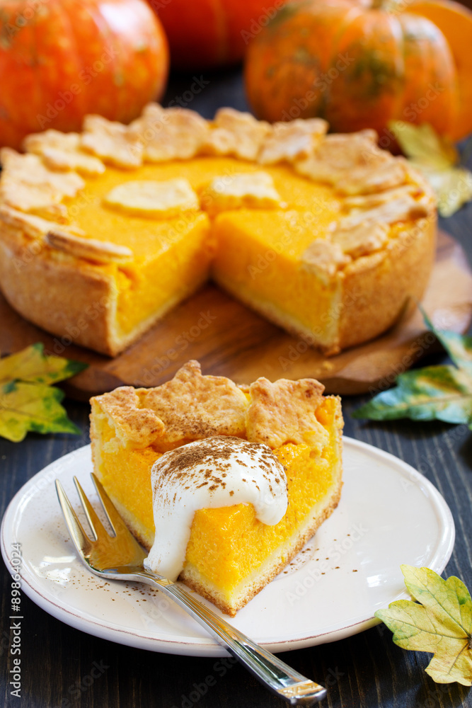 Pumpkin Pie on Thanksgiving Day feast. Pumpkin Pie on Thanksgiving Day feast.