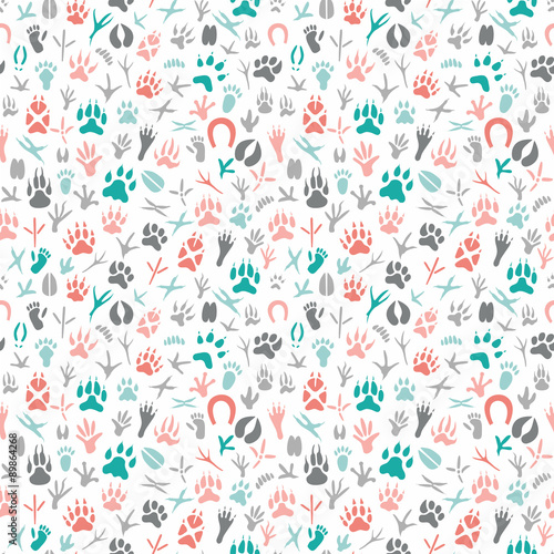 Seamless pattern with footprint of birds and animals