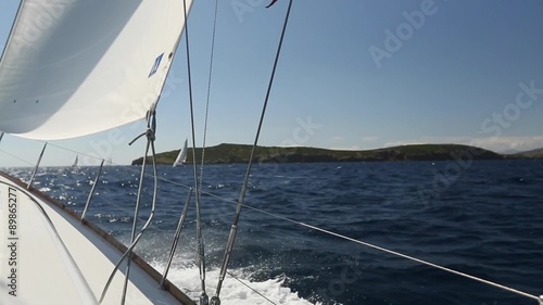 Sailing. Ship yachts with white sails in the Sea. Luxury boats. Boat competitor of sailing regatta.