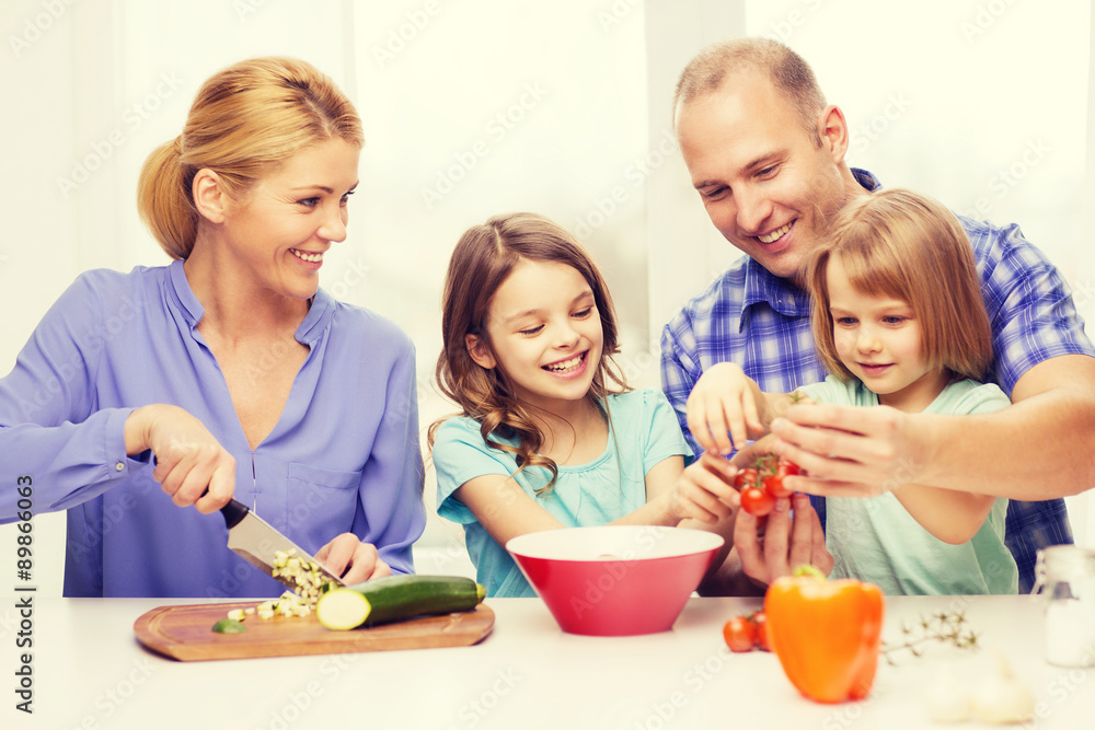 happy family with two kids making dinner at home happy family with two kids making dinner at home