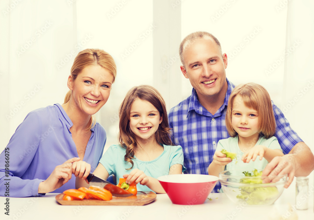 happy family with two kids making dinner at home happy family with two kids making dinner at home