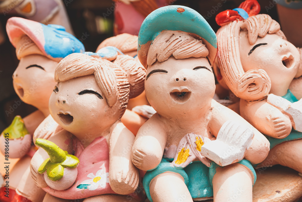 Fototapeta premium Smiling and laughing clay doll, Happy concept.
