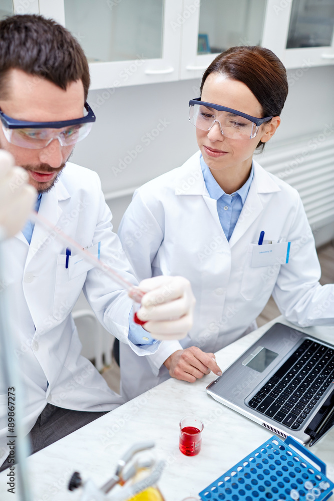 young scientists making test or research in lab young scientists making test or research in lab