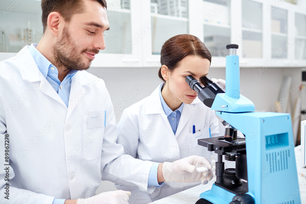 young scientists making test or research in lab young scientists making test or research in lab