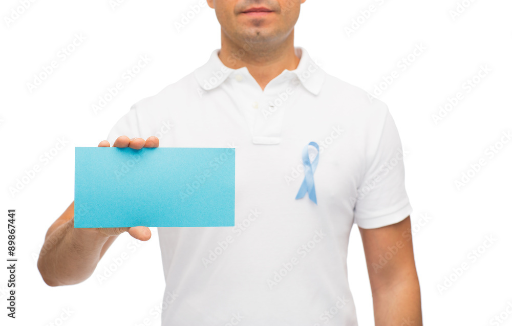 man with prostate cancer awareness ribbon and card man with prostate cancer awareness ribbon and card