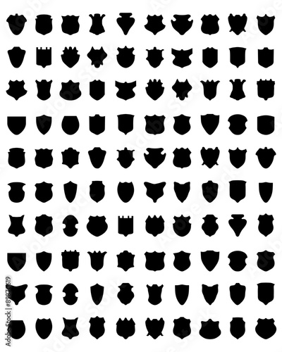 Black silhouettes of shields on white a background, vector