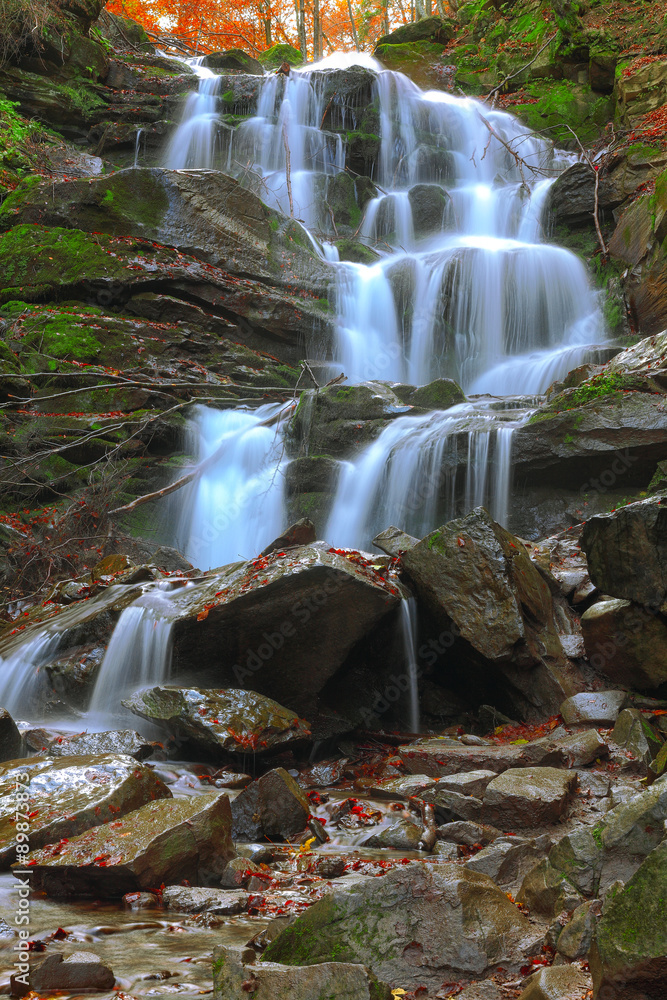 Fototapeta premium waterfall in the autumn forest