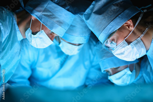Fotografie Young surgery team in the operating room