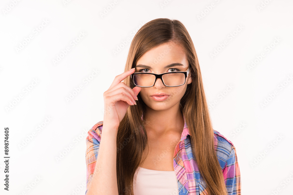 sexy girl adjusts her glasses