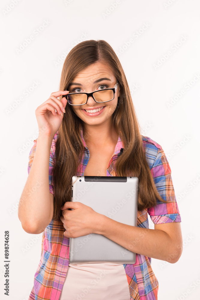 girl in glasses with a digital tablet girl in glasses with a digital tablet
