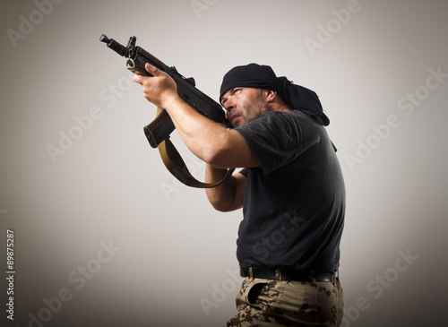 Photo Man with gun