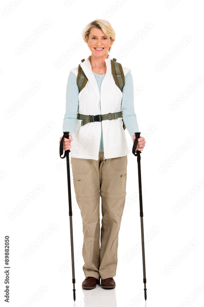 mid age female hiker standing