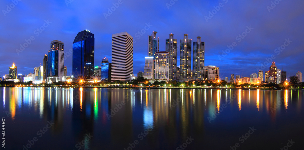 Naklejka premium panorama reflection of the city in the lake