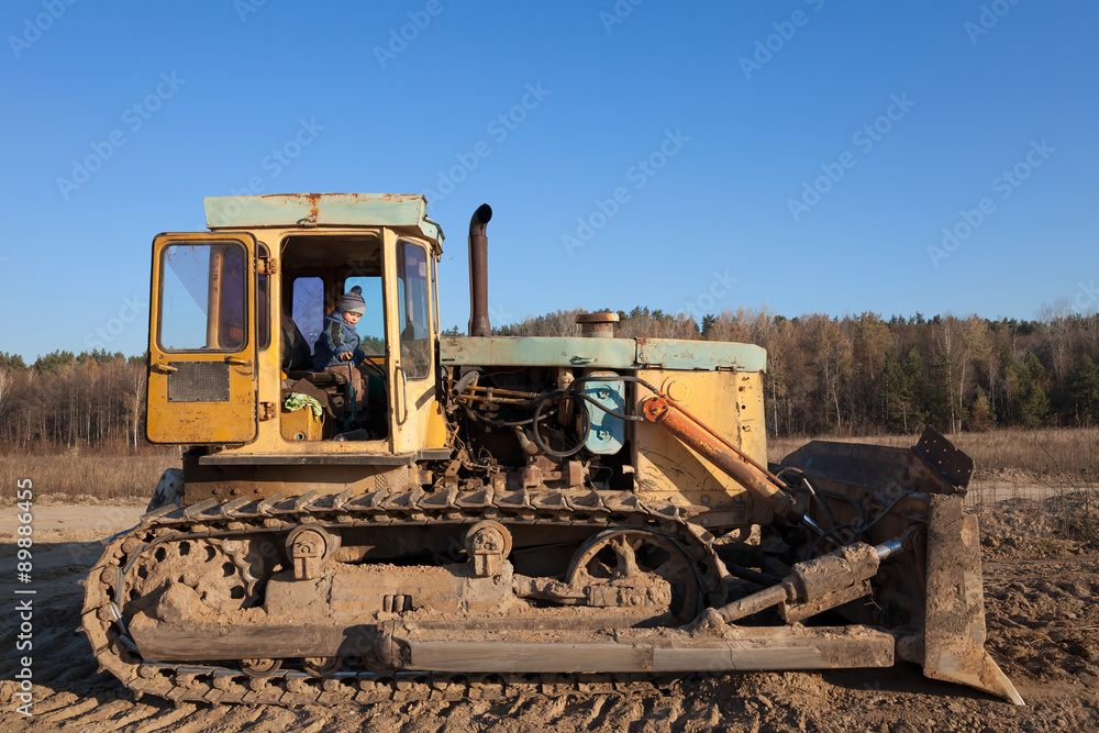 Little boy in bulldozer