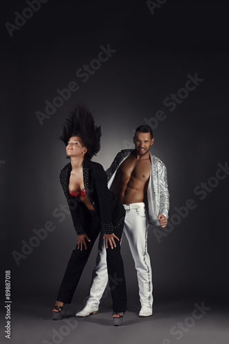 Sexy dancers posing in pair. Studio photo