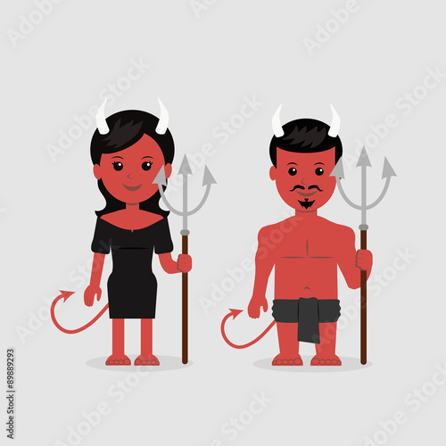Male and a female in a devil costume with a trident