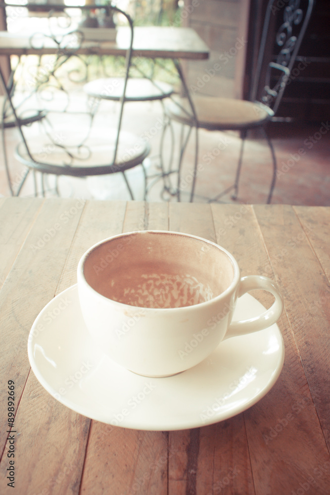 Hot Chocolate.Placed on a wooden table in a coffee shop. Hot Chocolate.Placed on a wooden table in a coffee shop.