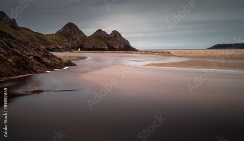 The river at Three Cliffs Bay Well known landmark and beautiful beach in Gower, south Wales.