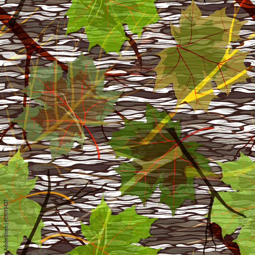 Camouflage seamless pattern with maple leaves photo