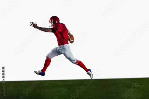 American football player playing football © WavebreakmediaMicro