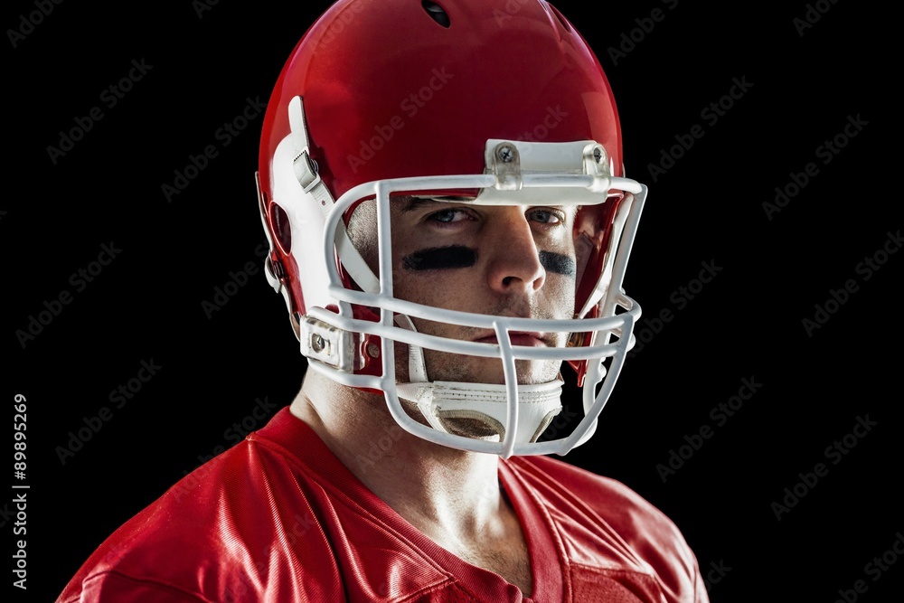 American football player looking at camera American football player looking at camera