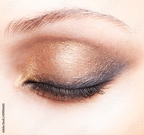 Close-up shot of female closed eye make-up