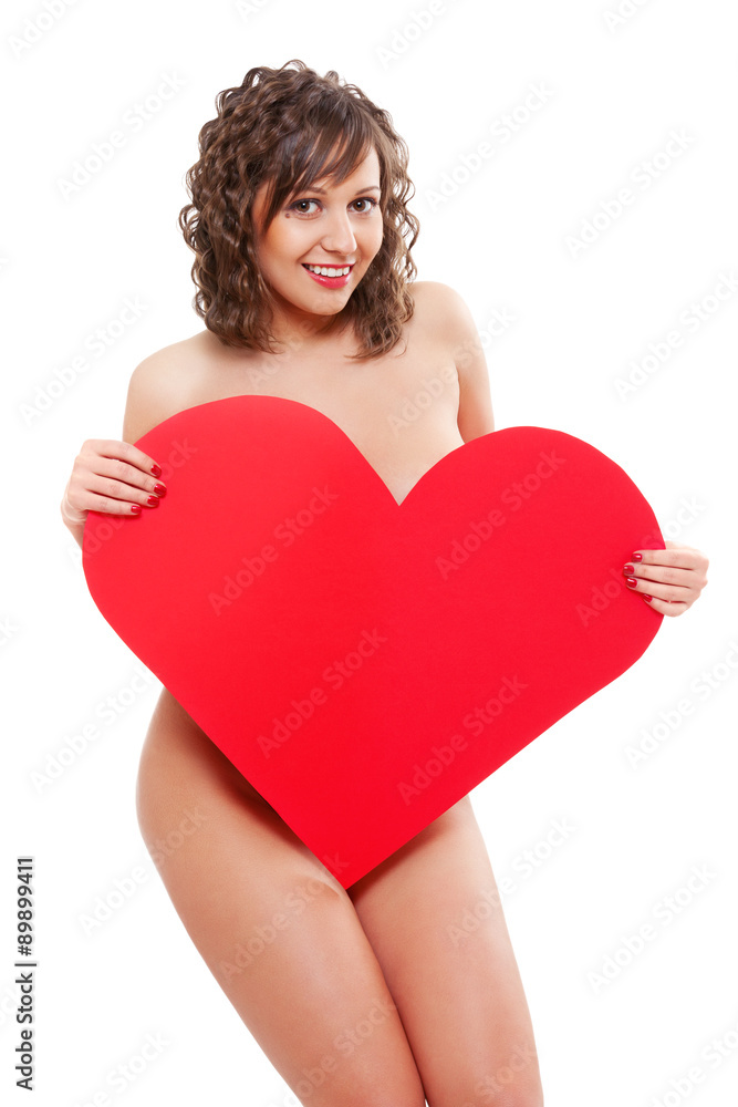 Young woman holding red paper heart Young woman holding red paper heart