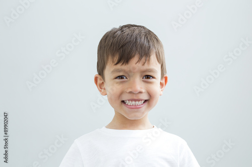 Landscape headshot of young boy