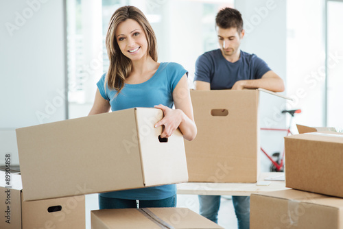 Young couple moving in their new house