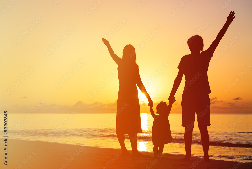 happy family with kid having fun on sunset beach