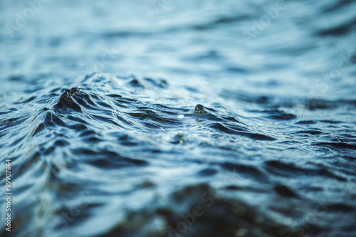 Fototapeta Naklejka Na Ścianę i Meble -  Closeup image of water waves outdoors at sea background.