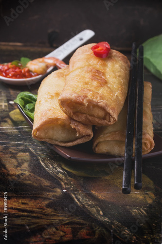 Fried spring rolls with  shrimps, bok choi, chili pepper and hot