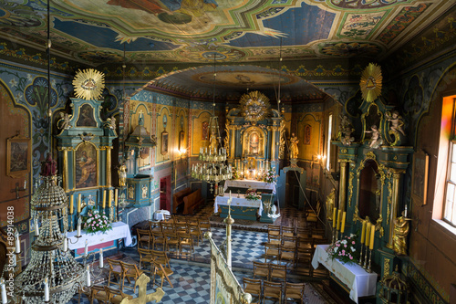 PODSTOLICE, CRACOW, POLAND - JUNE 30, 2015: Interior of the wooden antique church in Podstolice near Cracow. Poland photo