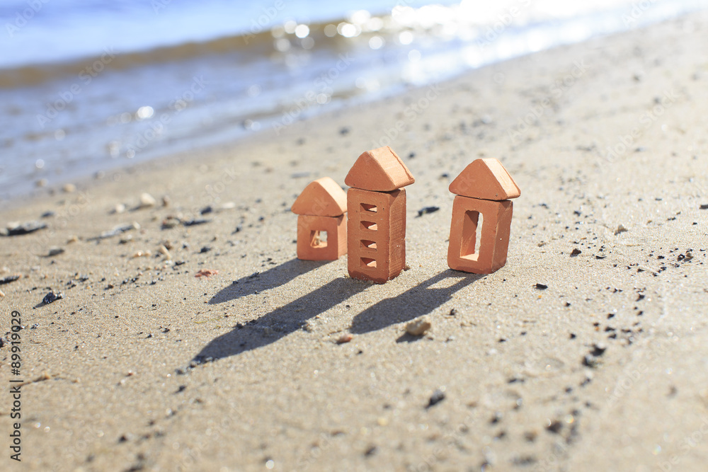 Naklejka premium seaside town. brick houses on the seashore
