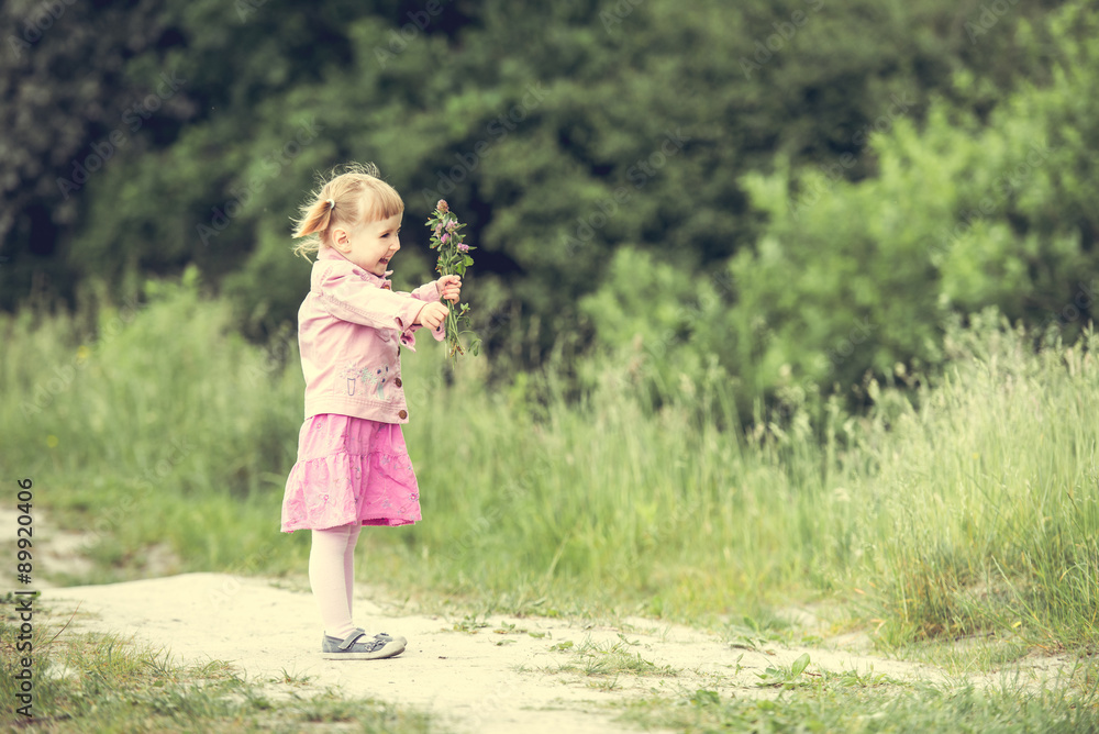 Cute little girl on the meadow Cute little girl on the meadow