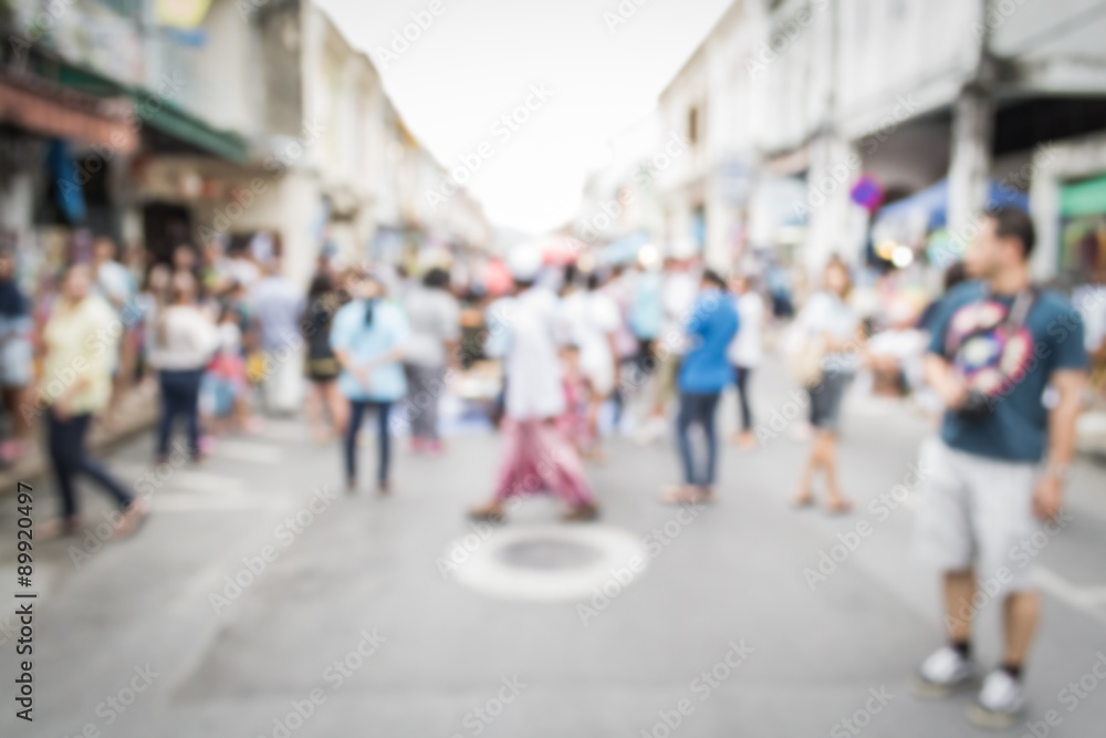 Obraz premium Blurred people walking on the street in phuket old town