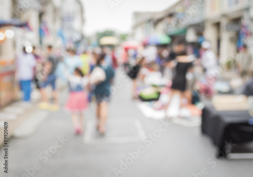 Blurred people walking on the street in phuket old town