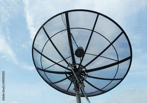 Satellite dish with blue sky background