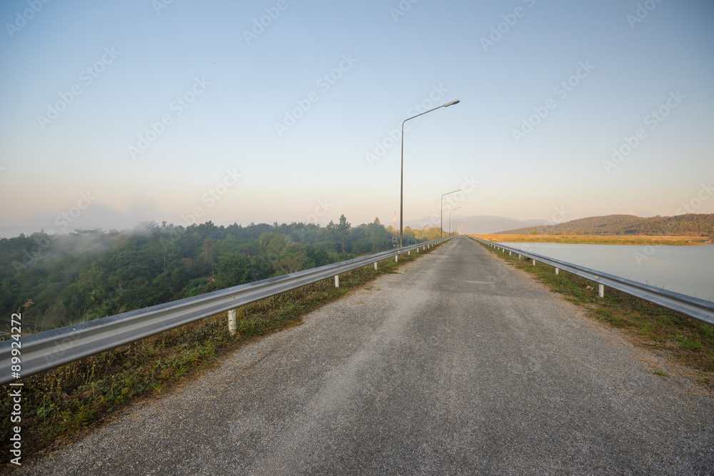 Road on the ridge of a dam Road on the ridge of a dam