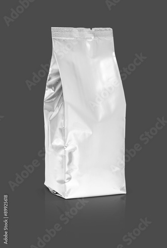 blank packaging foil pouch isolated on gray background