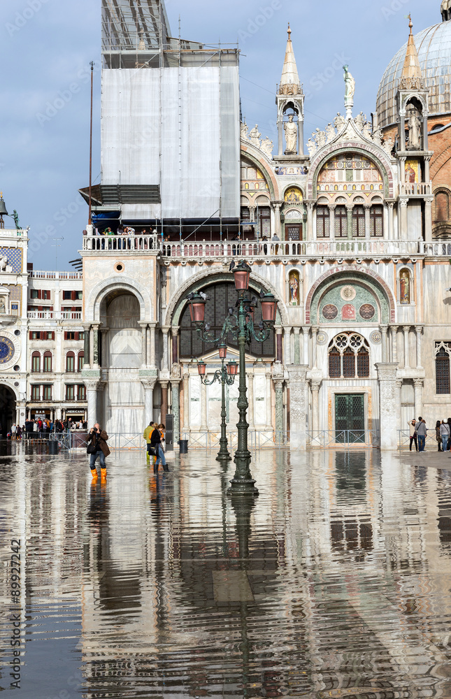 Flooding in Piazza San Marco. Venice is one of the most popular tourist destinations in the world Flooding in Piazza San Marco. Venice is one of the most popular tourist destinations in the world