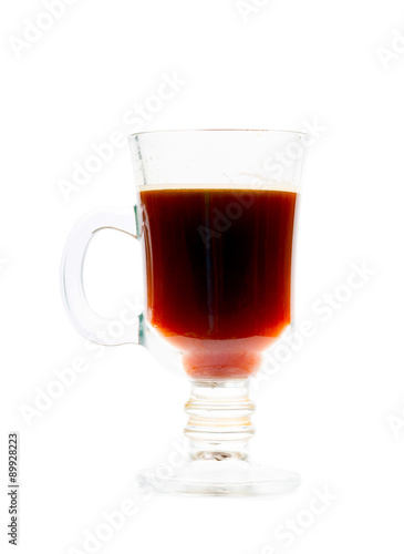 Glass cup of mulled wine on a white background