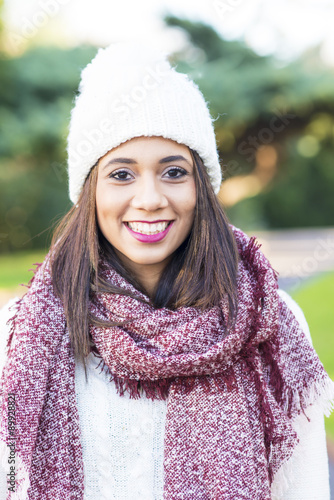 Portrait of beautiful smiling woman, winter style concept. photo