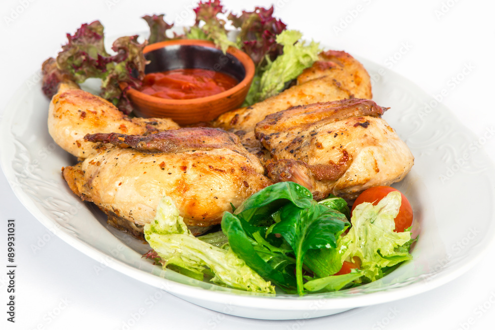 Grilled chicken on the plate with salad