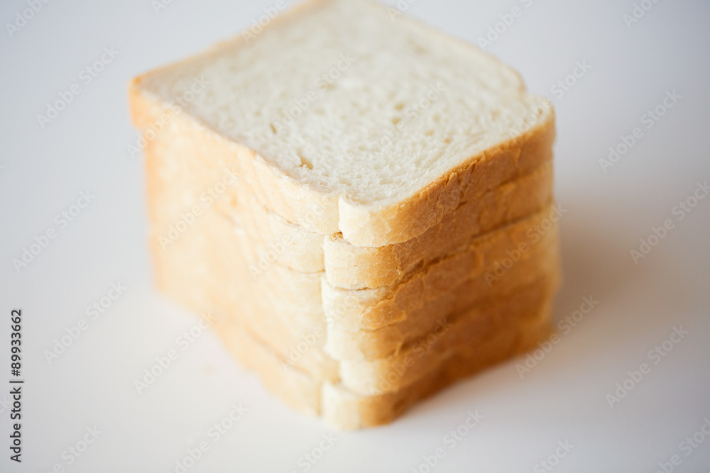 close up of white toast bread on table