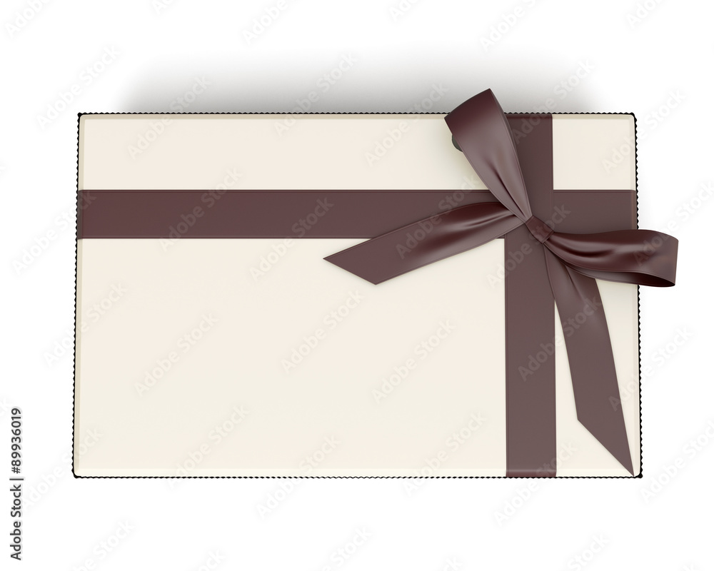 Festive box with ribbon and bow chocolate colored top view Festive box with ribbon and bow chocolate colored top view