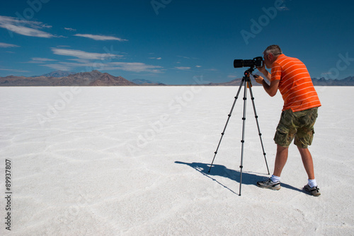 Photographer in the salt desert, Bonneville, Utah