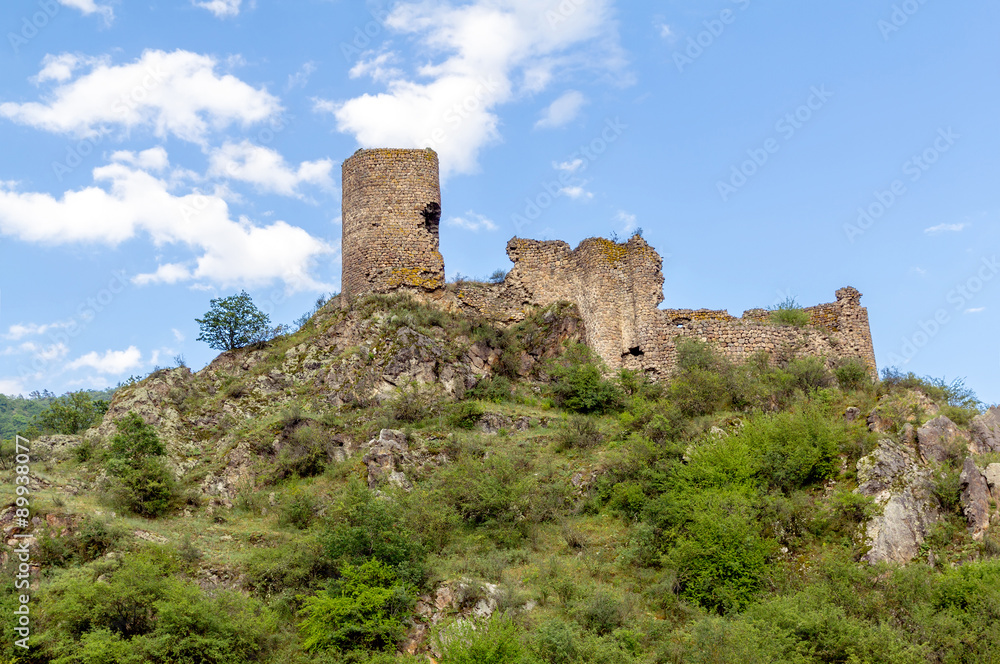 Medieval fortress Moktsevis against the blue sky, Georgia