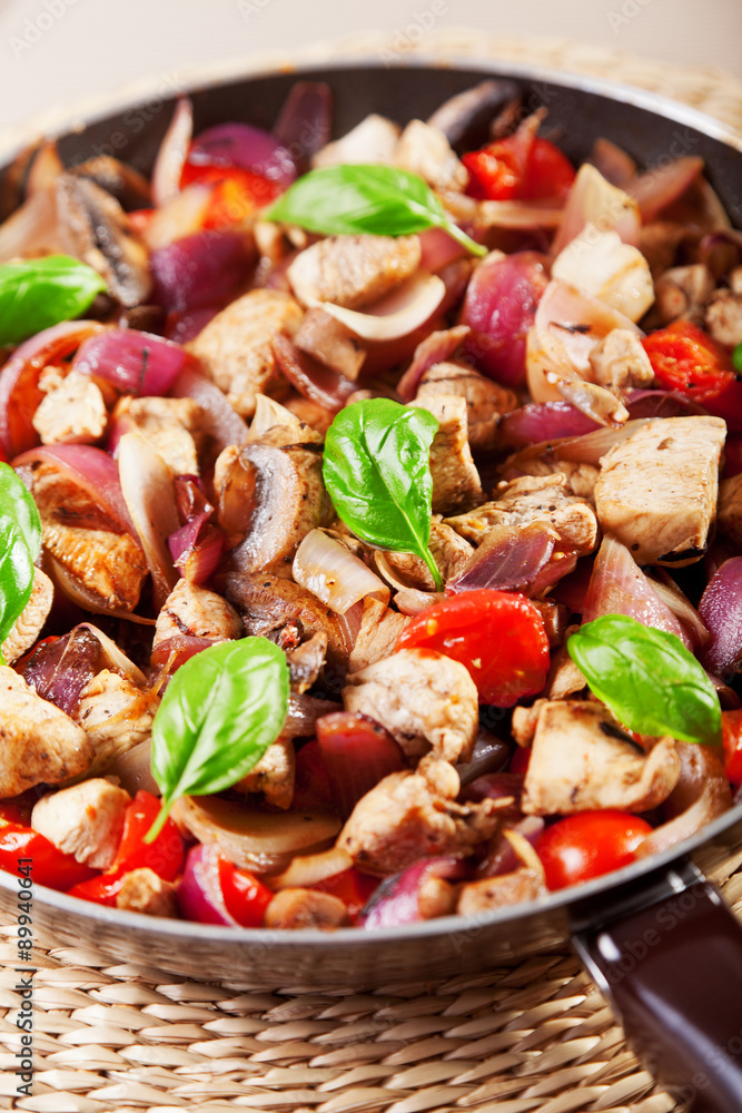 Chicken with onion and cherry tomatos Chicken with onion and cherry tomatos